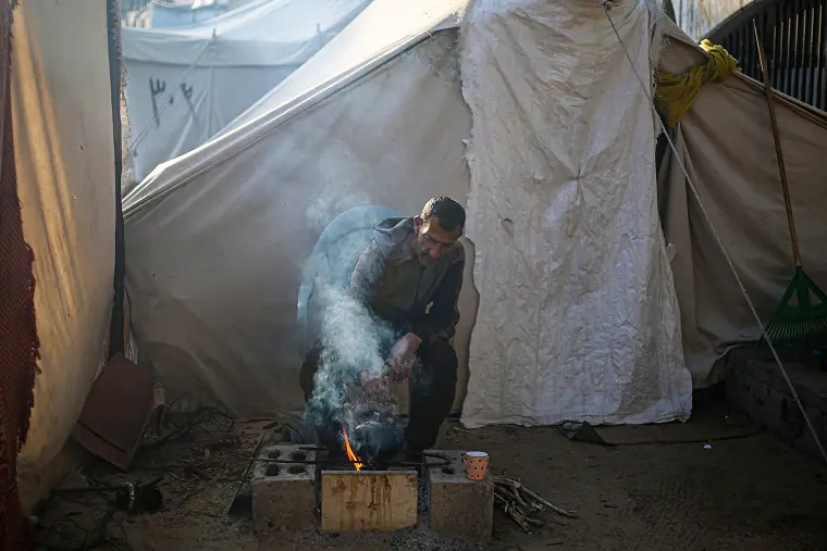Displaced Palestinians seeking shelter in Gaza