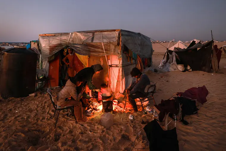 Displaced Palestinians seeking shelter in Gaza